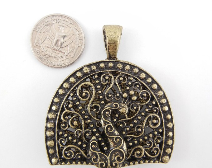 Antique or Burnished Gold-tone Dimensional Filigree Peacock Pendant