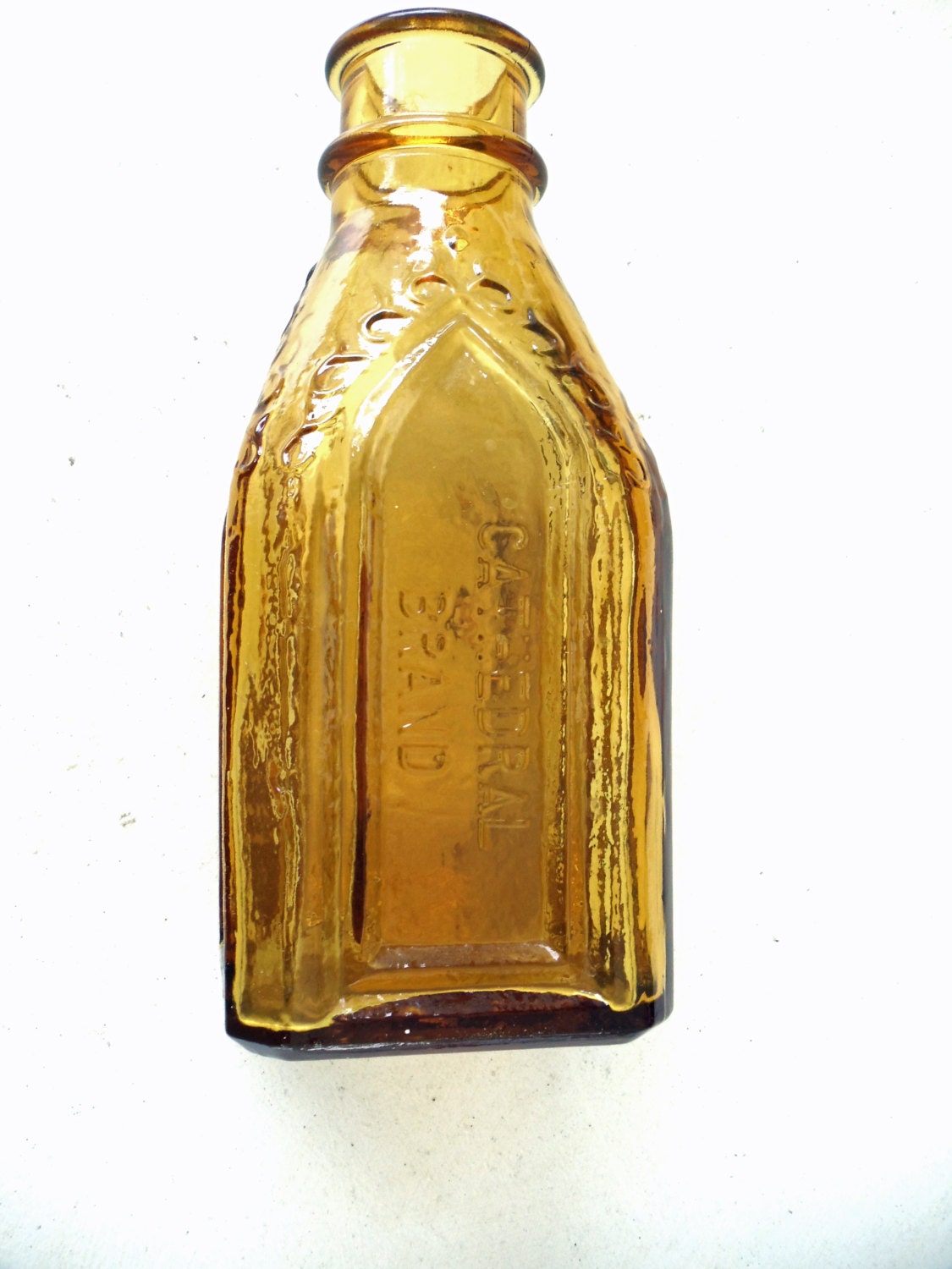 Gold Glass Chief Wahoo Electric Tonic Bottle