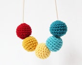 Ball Necklace in teals, gold and red