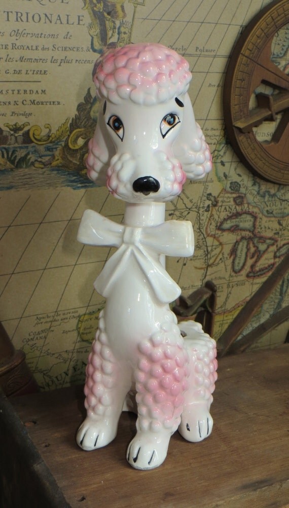 vintage pink porcelain poodles