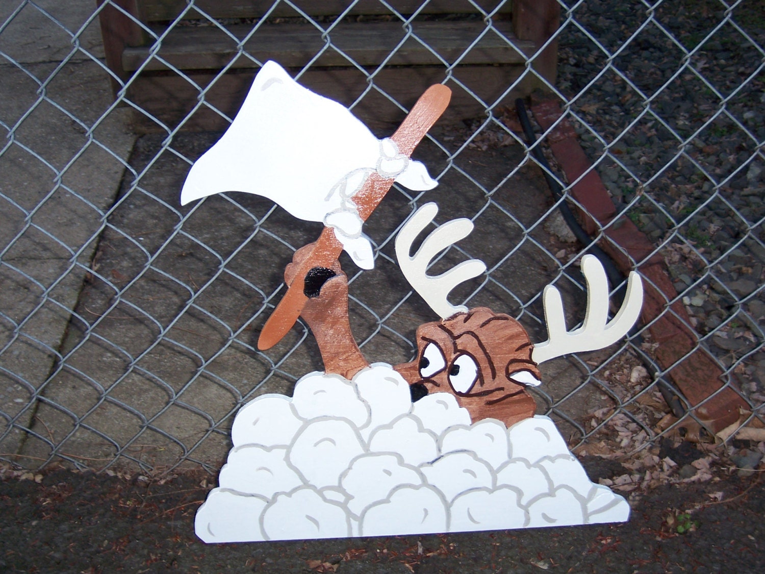 Handmade custom painted wooden reindeer with white surrender flag for your yard