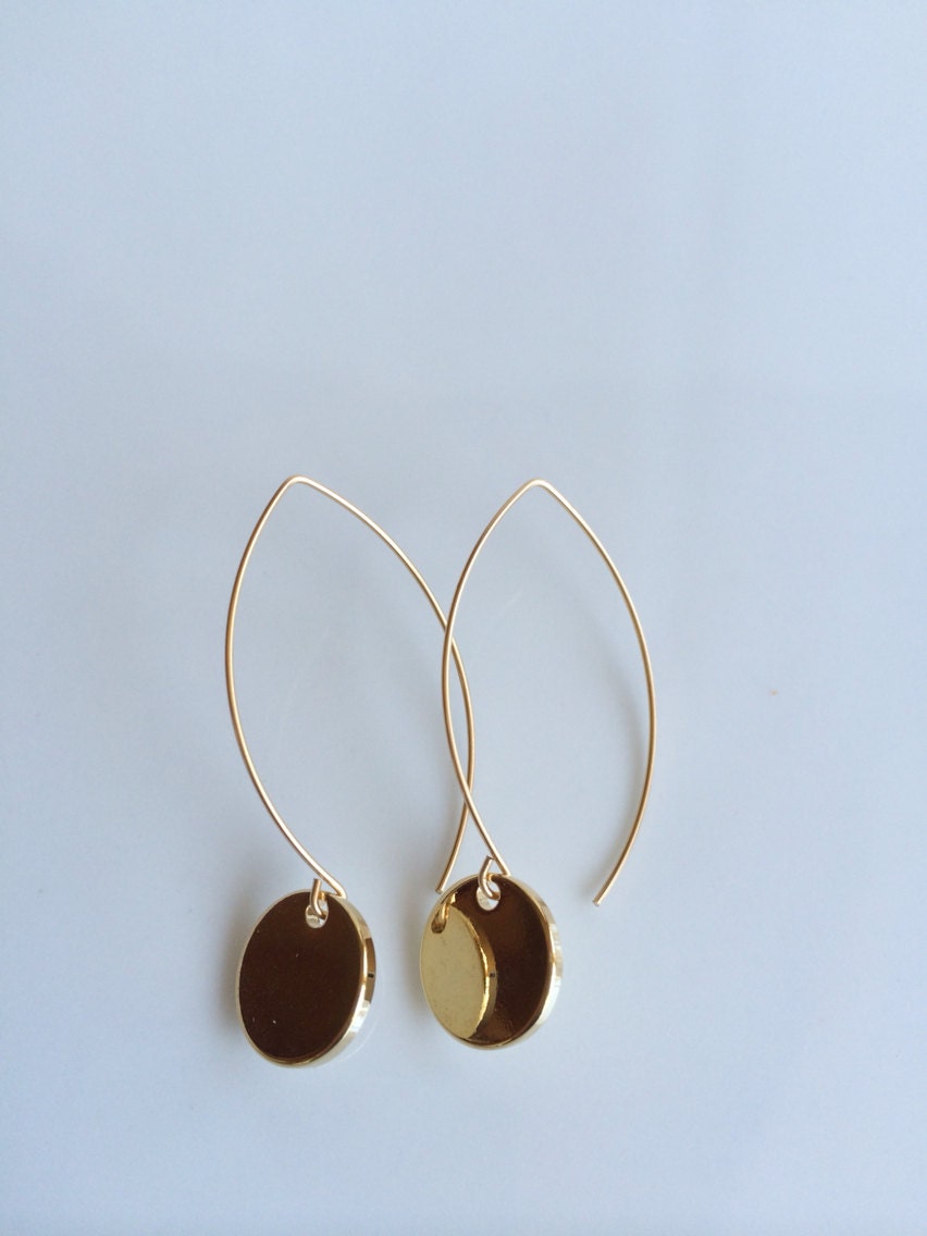 Shiny gold dangle earring by sarakcaudle on Etsy