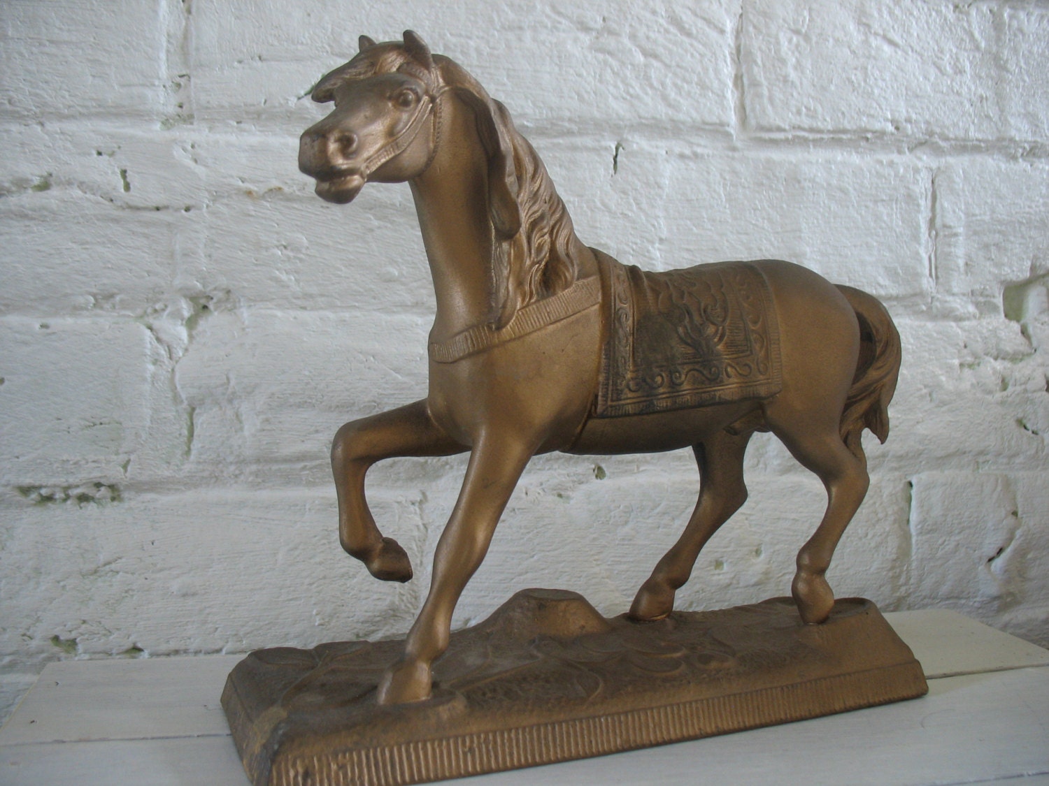 old metal horse figurines