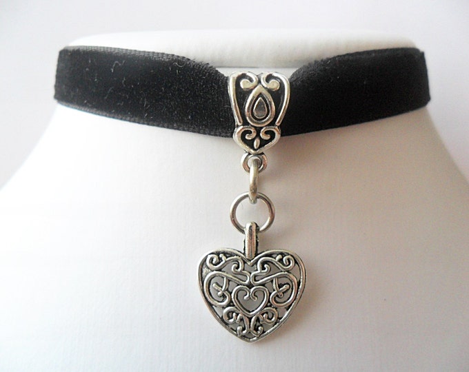 Black velvet choker necklace with tibetan silver heart pendant with a width of 3/8"inch.