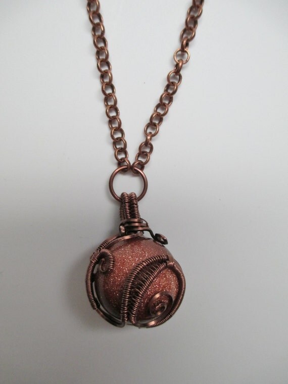 Wire Wrapped Goldstone Orb Necklace in Antique Copper