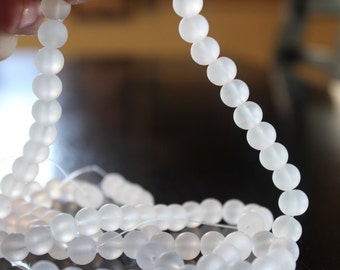 100 approx. 8 mm white frosted glass beads, round and smooth, one strand for making jewelry