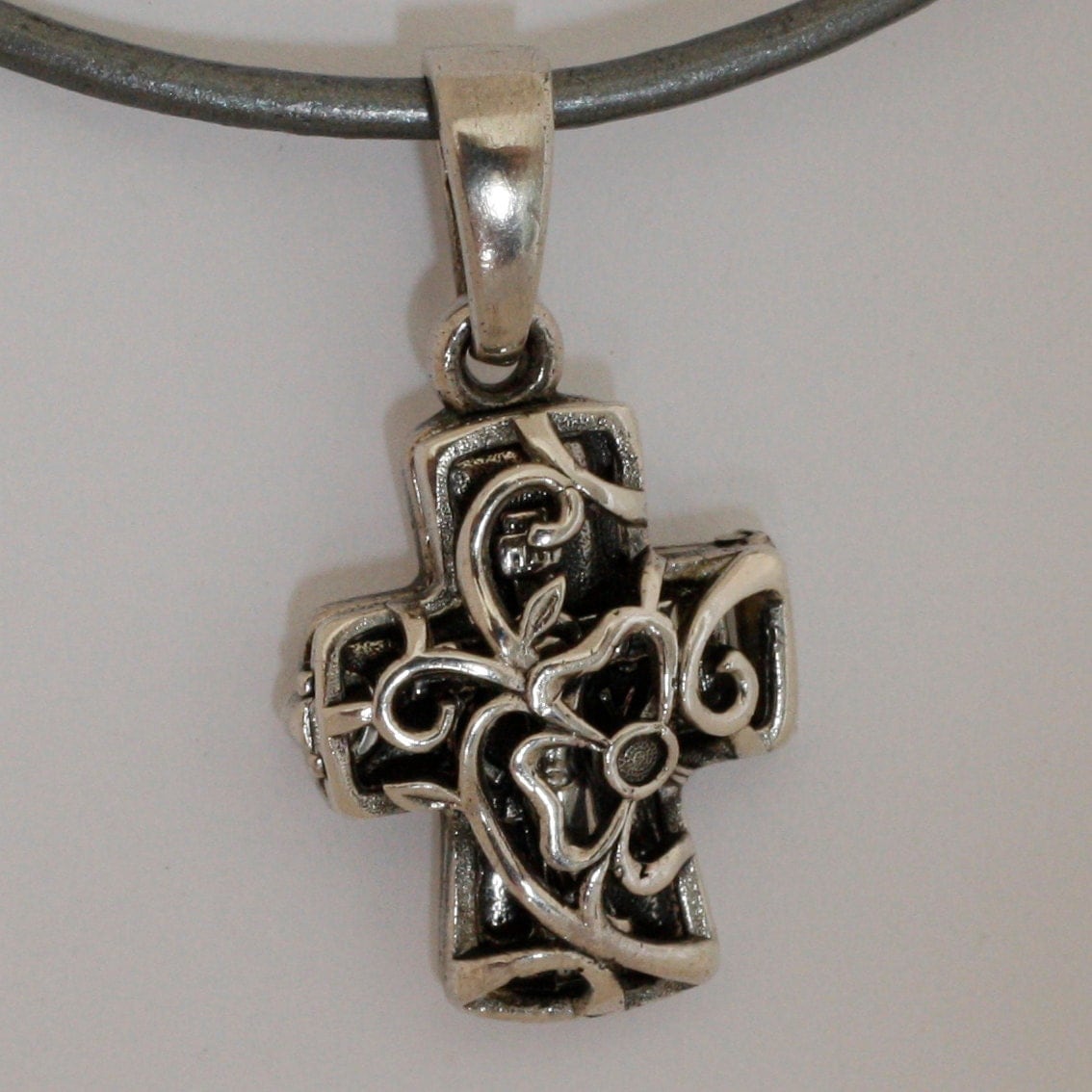 Silver Christian locket cross pendant.