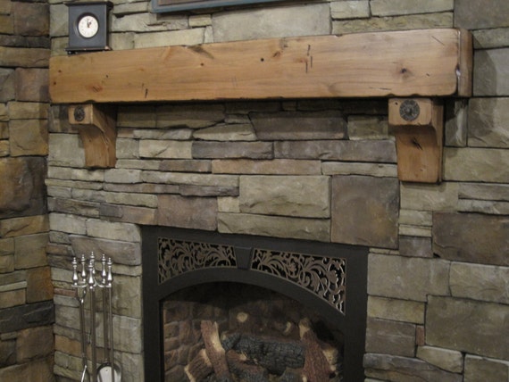 Floating Fireplace Mantel Old Salvaged Beam Shelf Corbels Our Durango shelf is shown here in Knotty Alder and its one of our top selling mantels. Each one is distressed and glazed by hand giving it that shabby-chic effect and makes each shelf unique. It is used mainly as a fireplace mantel however it has also be