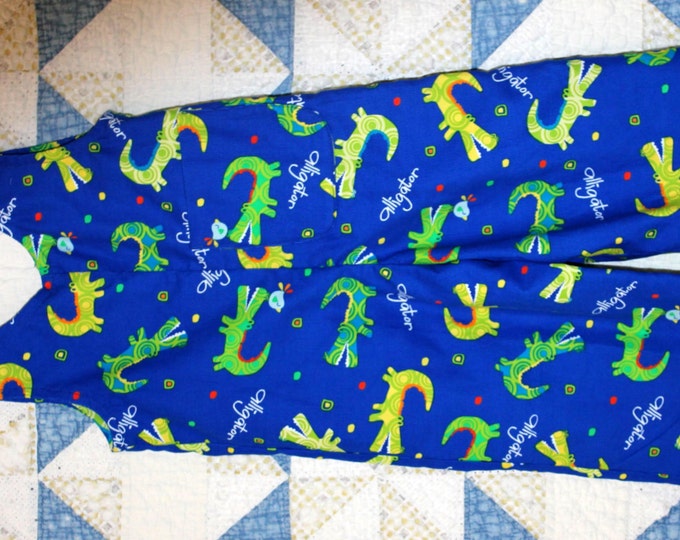 HALF PRICE ** Alligator Overalls. Boy's Size 2T Corduroy Overalls Green Alligators on bright blue background. Back pocket.