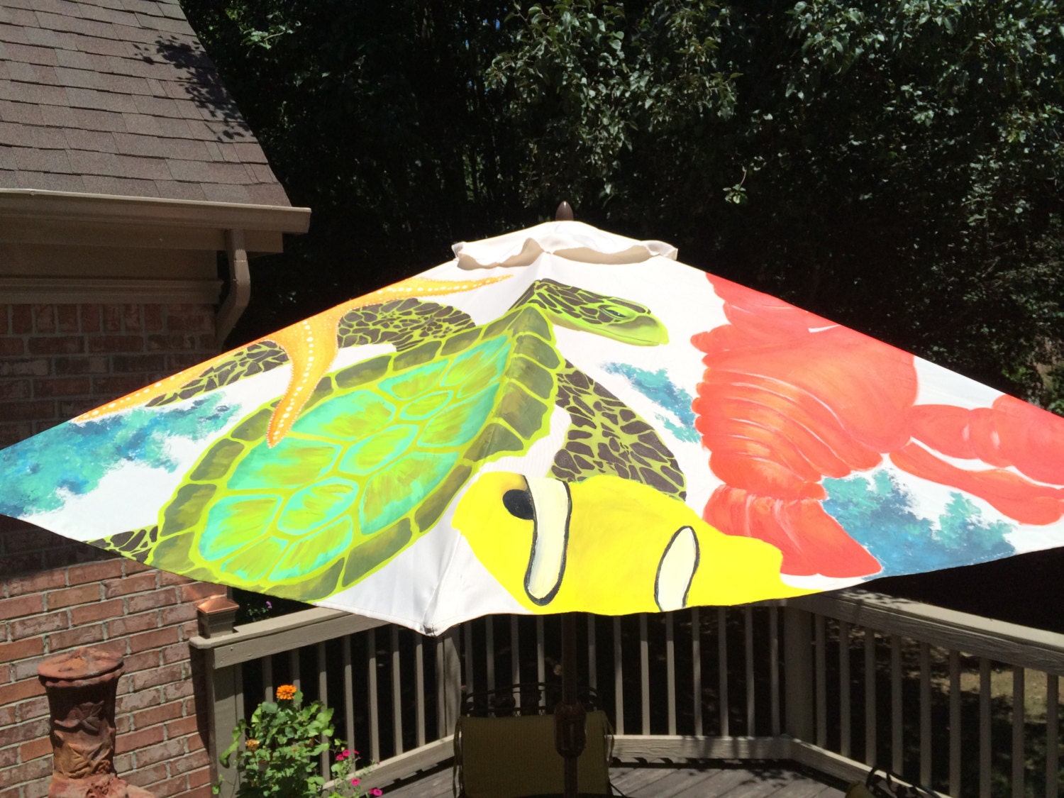 Unique hand painted patio umbrellas. Original by kimmillerdesigns