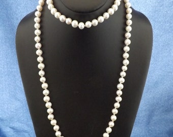 42" Hand Knotted White fresh water pearl necklace.
