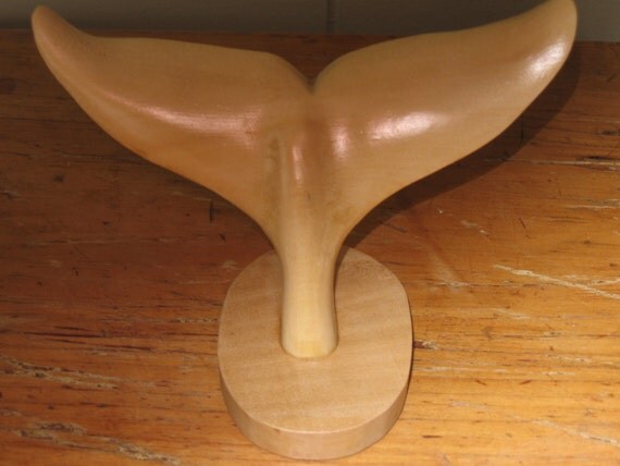 whale tail figurine