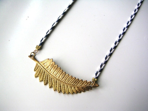 gold fern leaf necklace pendant with navy and white chevron cord
