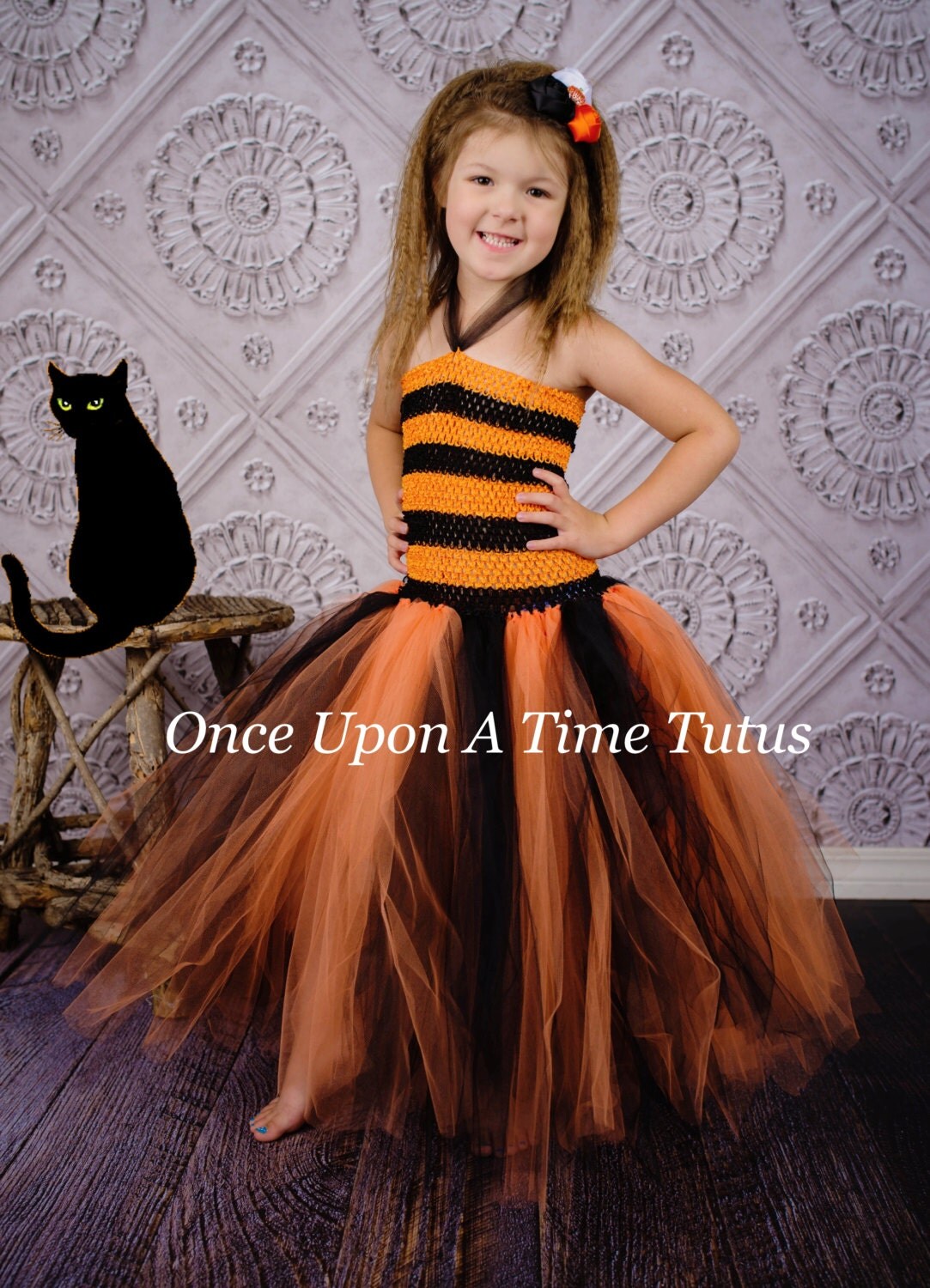 adult orange and black tutu
