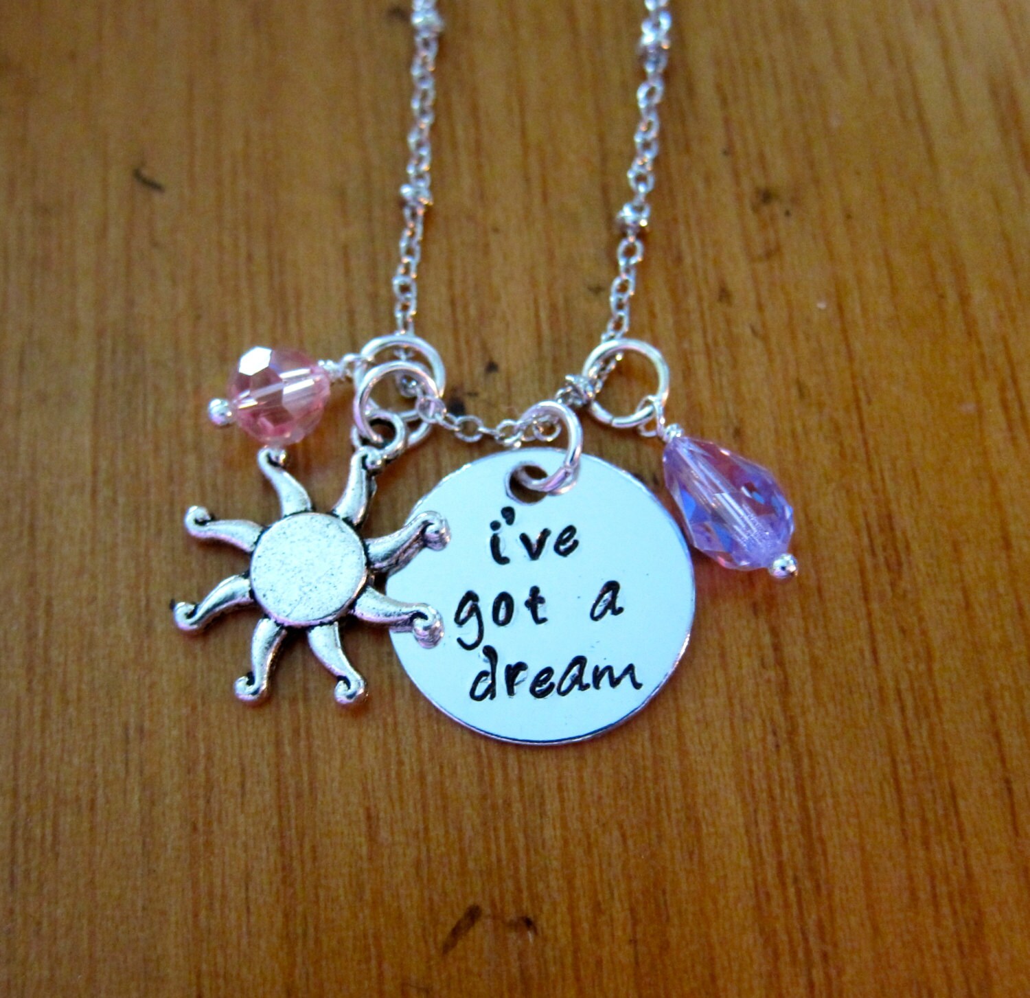 tangled rapunzel sun necklace