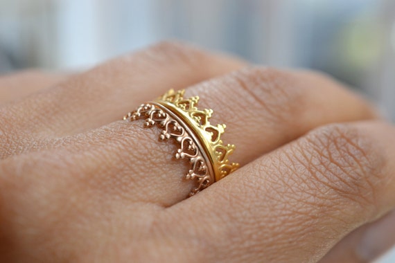 Gold crown ring wedding ring. engagement band. There is