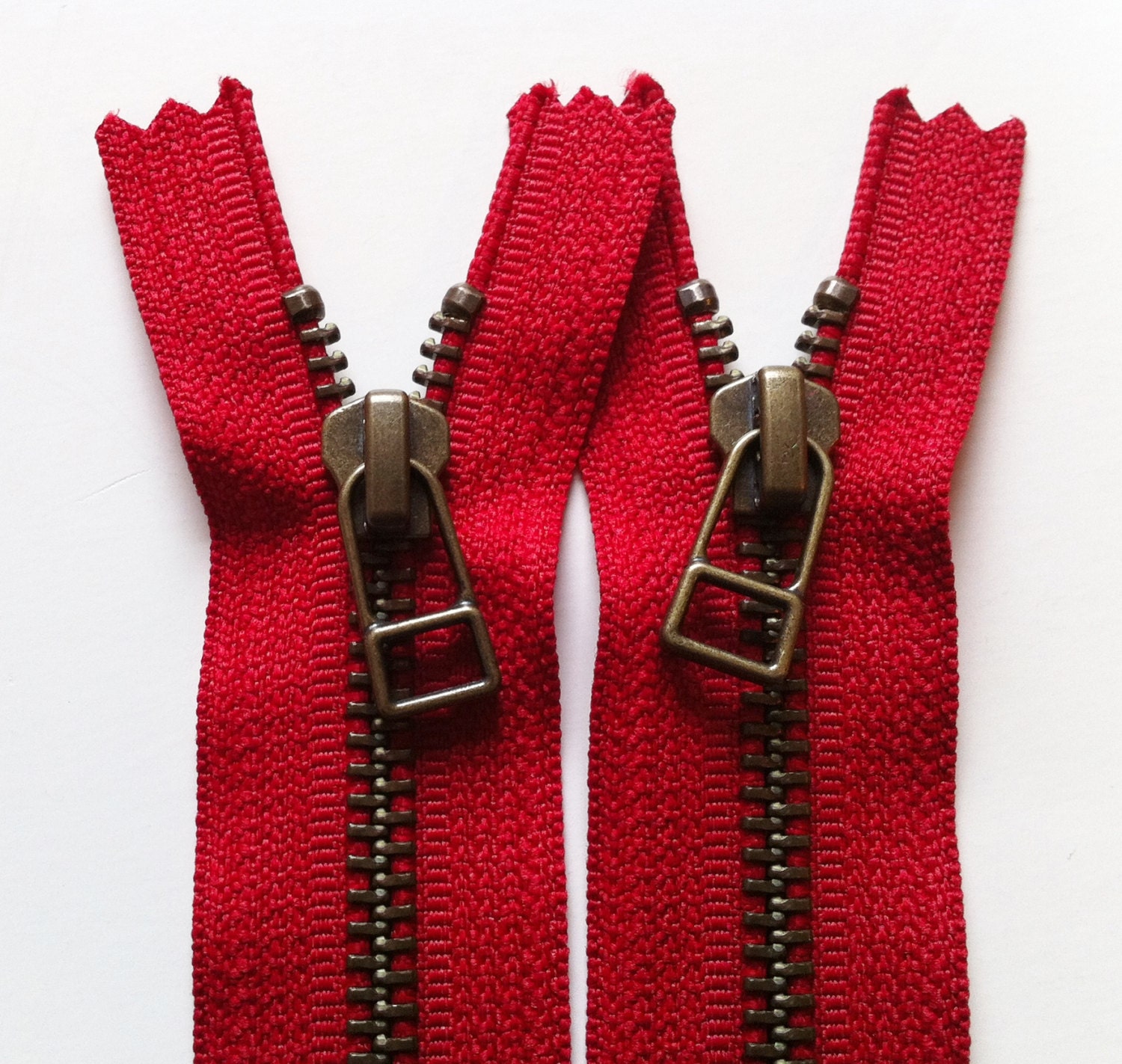 YKK metal zippers with antique brass finish and DHR style