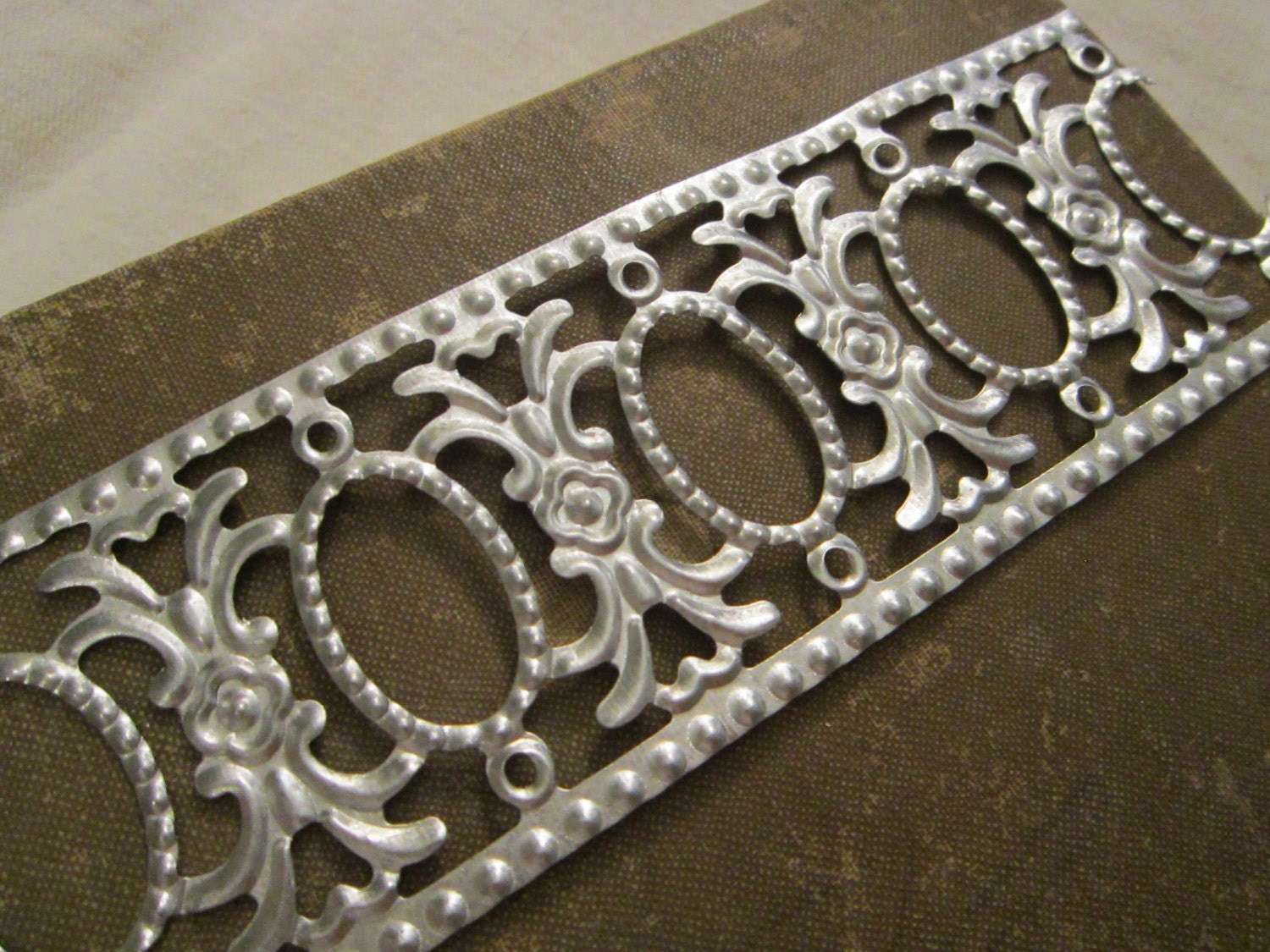 embossed metal strip 9 feet x 2 inches by theartfloozy on Etsy