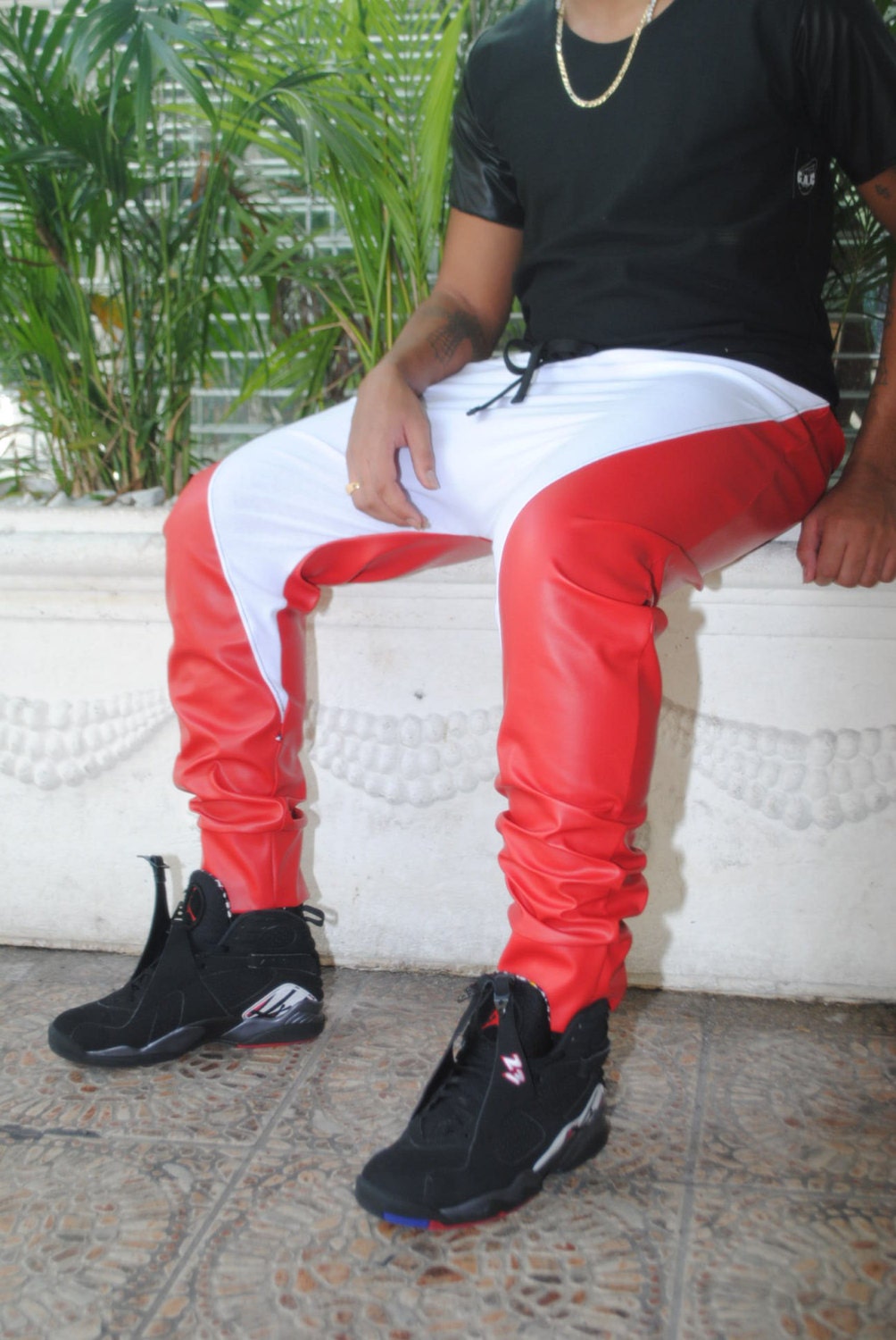 red faux leather joggers