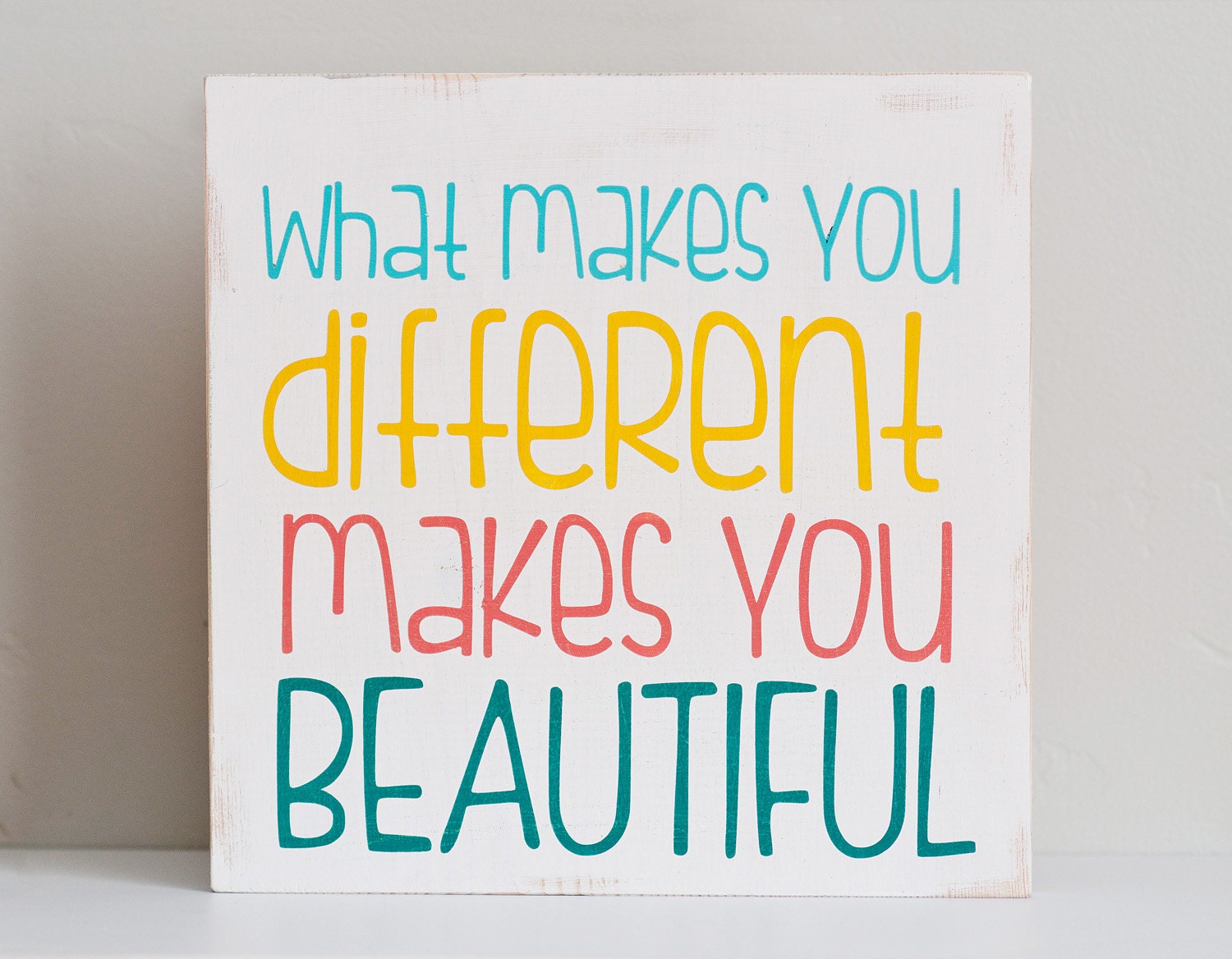 what-makes-you-different-makes-you-beautiful-wooden-sign