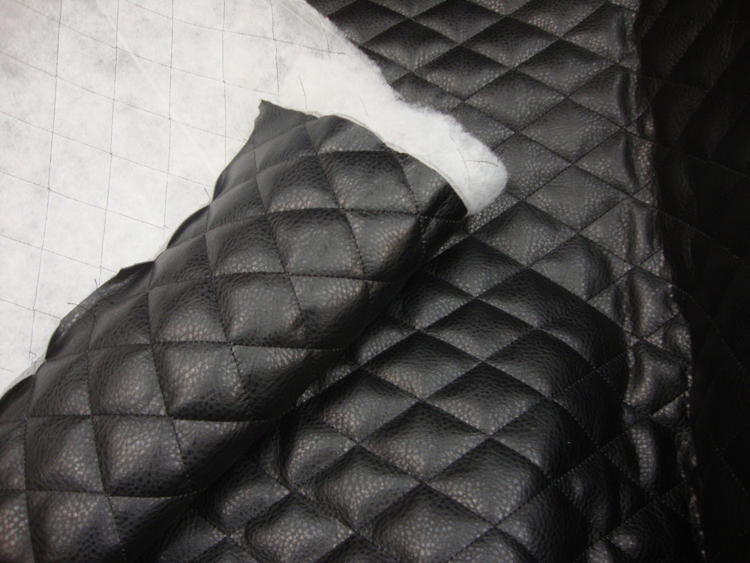 black-quilted-faux-leather-fabric-with-1-2-batting-sheet