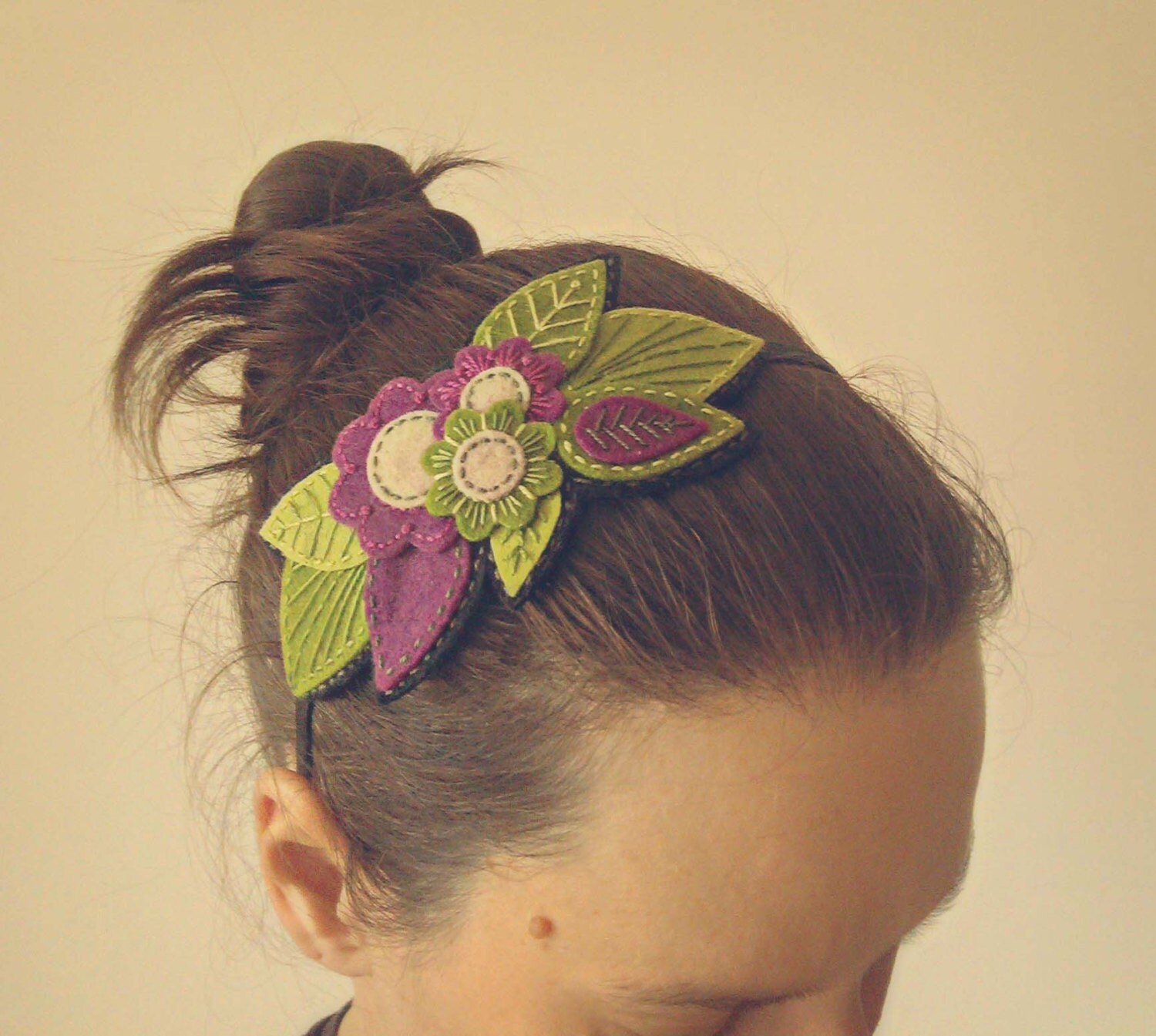 Embroidered felt headband with flowers and leaves embroidered