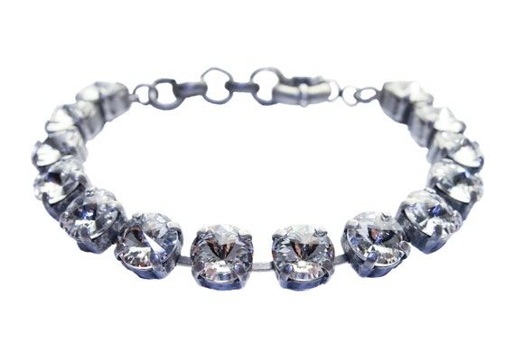 Items similar to Clear Swarovski crystal bracelet with silver finishing ...