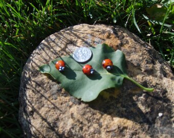 lampwork lady bugs three, handmade