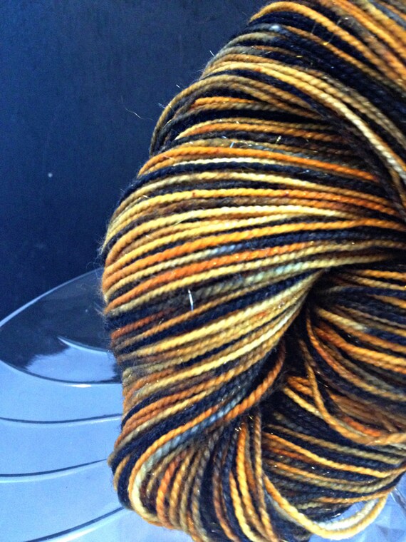 Items similar to Black and Gold Sparkle Cinna Hunger Games Hand Dyed
