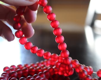 100 approx. 8 mm red frosted glass beads, round and smooth, one strand for making jewelry