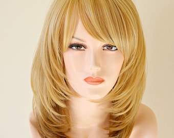 Ombre blonde mix layer cut. Everyday wear on the go wig.