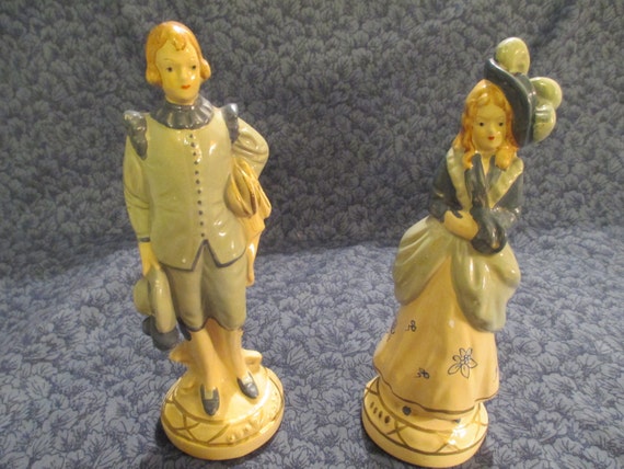 antique colonial figurines