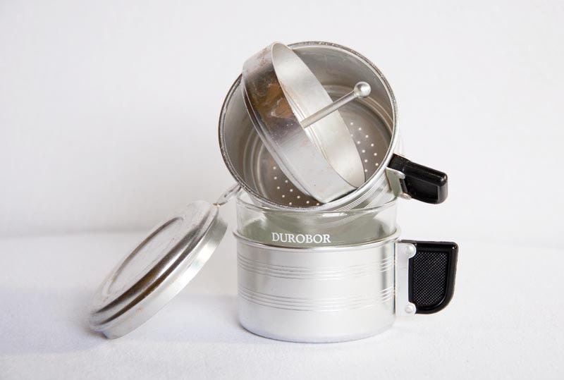 Vintage French Press style single cup coffee maker. Haute Juice