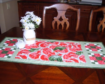 Table runner has organic cotton batting for added body. Wash in cold water, dry cool setting.