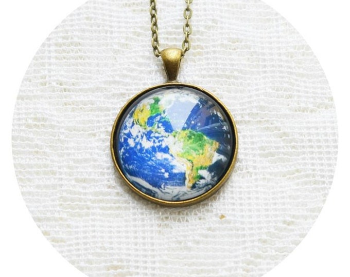 The SPACE Round pendant with the image of the planet Earth from brass and glass retro and vintage