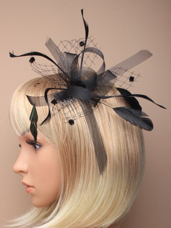 Items similar to Black Fascinator with looped ribbon and net on Etsy