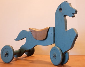 rolling riding horse toy