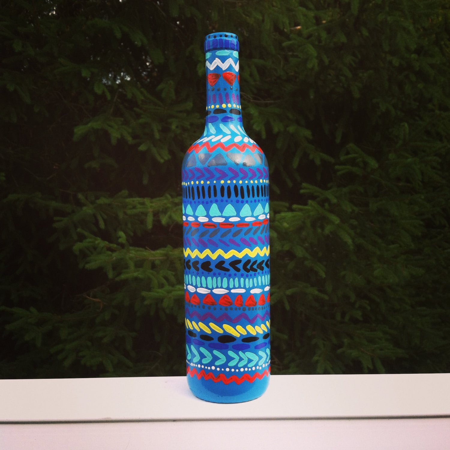 Tribal hand painted wine bottle by Spechtcessories on Etsy