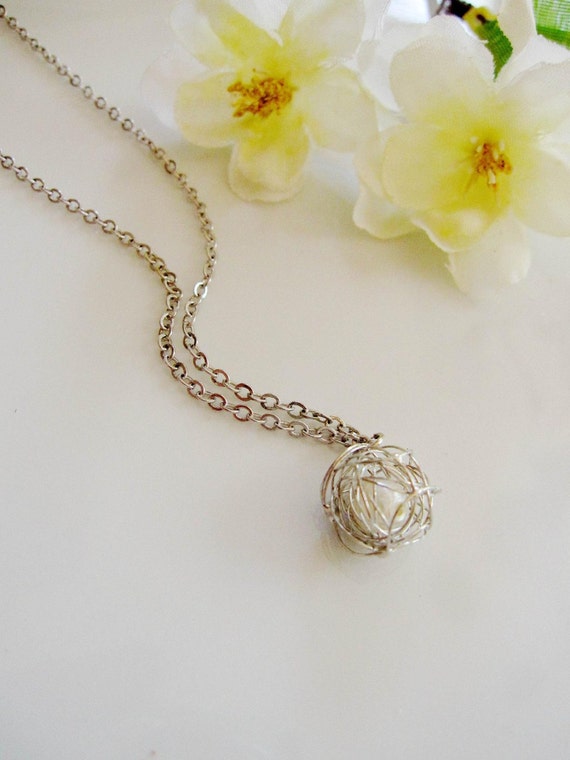 Silver Yarn Ball Necklace Freshwater pearl wrapped in Silver