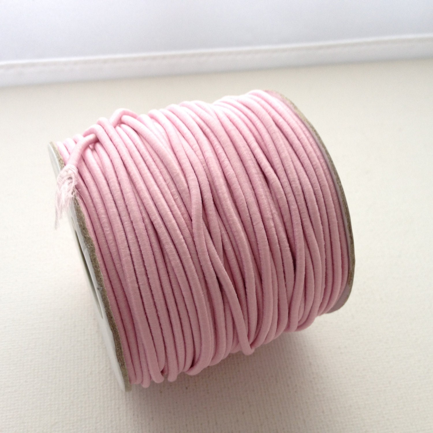 6 feet of 2mm Light Pink Elastic Cord Fabric Covered Rubber