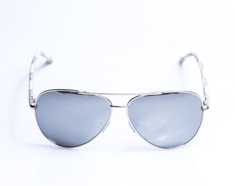 white cateye sunglasses with gold mirrored lenses