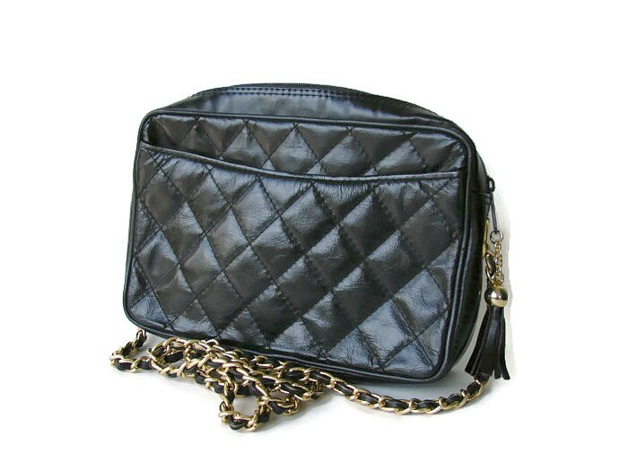 black quilted purse with gold chain