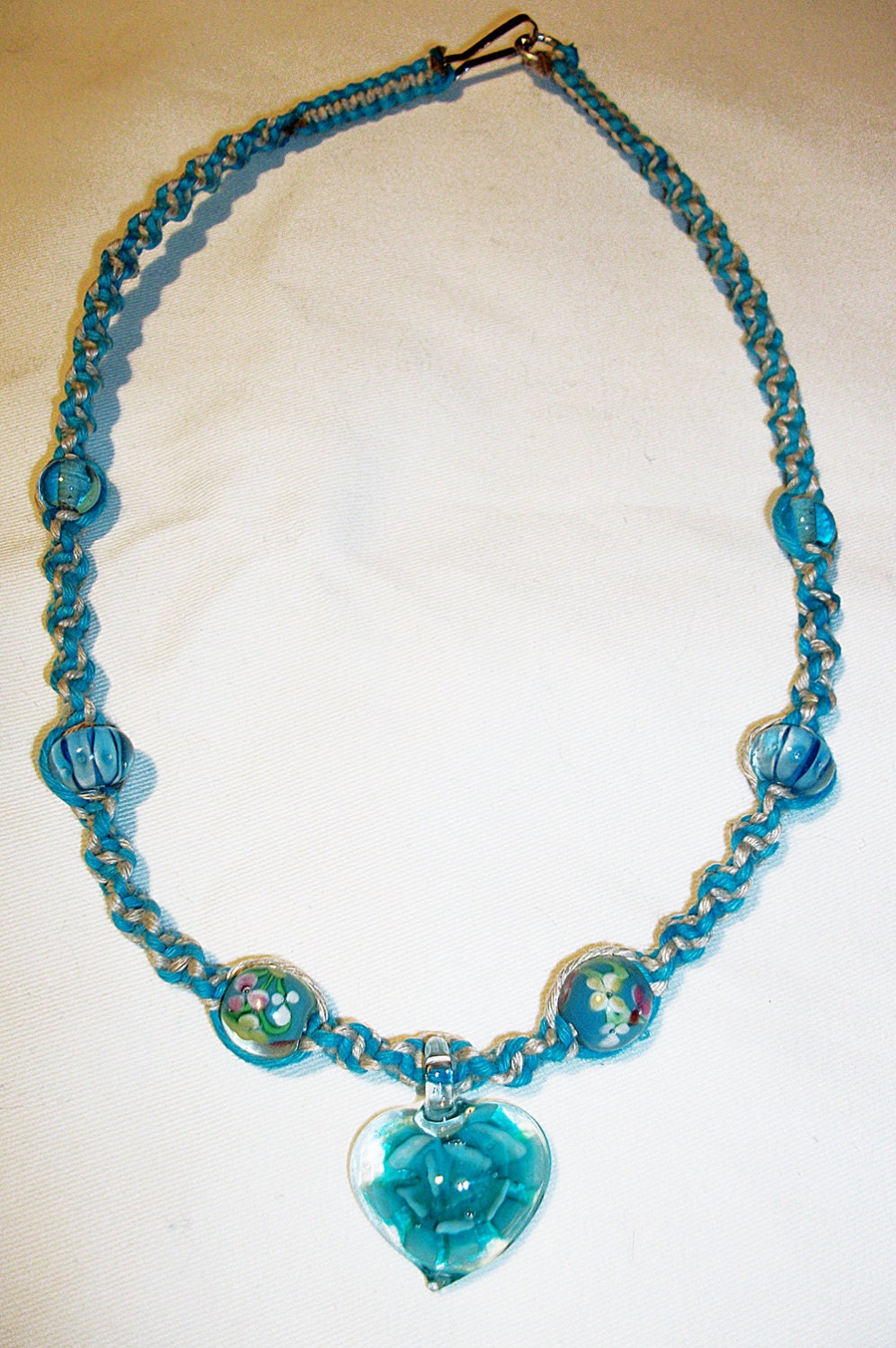 Turquoise Blue Flower of the Heart Hemp Necklace Lampwork