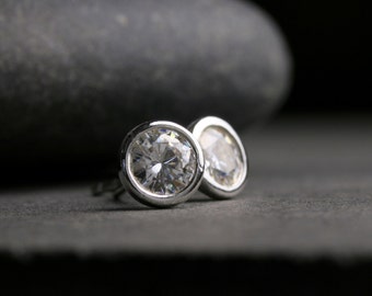 Large bezel set round brilliant cut Moissanite and sterling silver stud earrings 5mm one carat tw