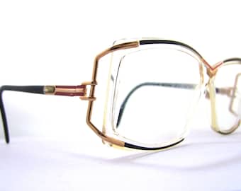 Popular items for designer eyeglasses on Etsy