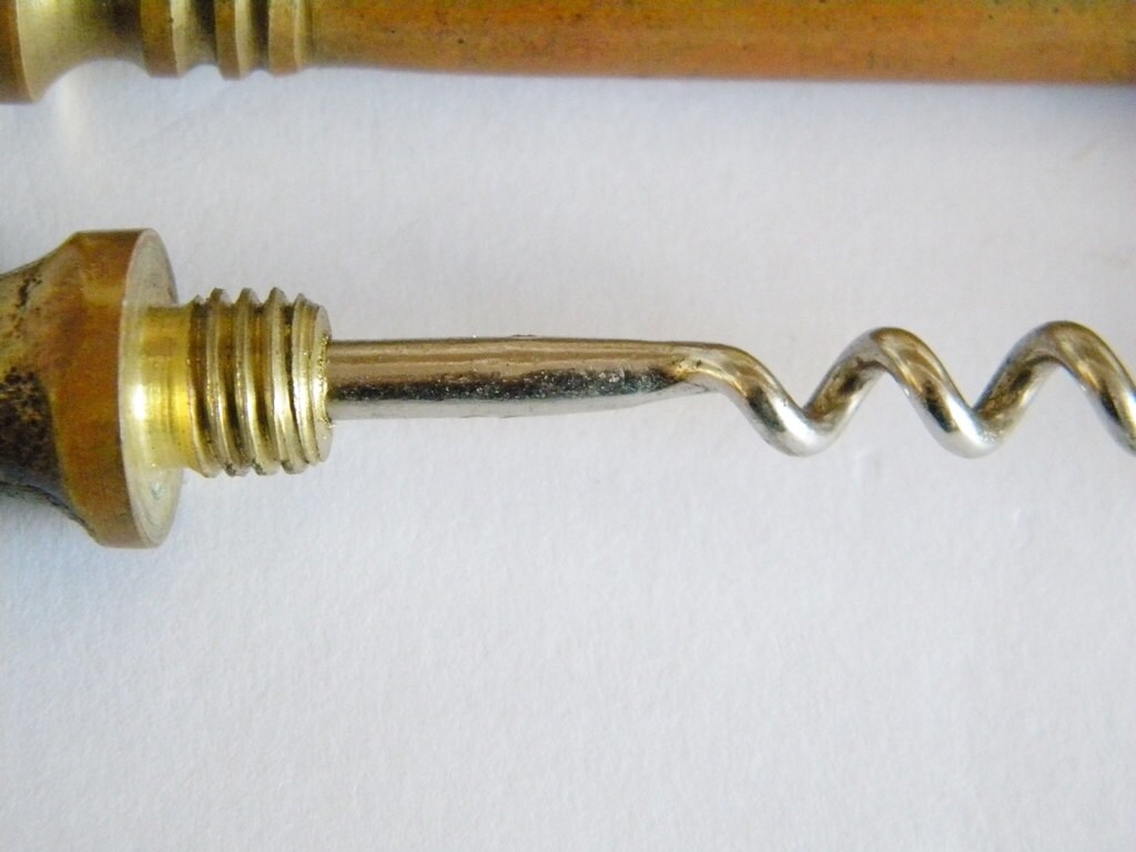 vintage key corkscrew in a key shape