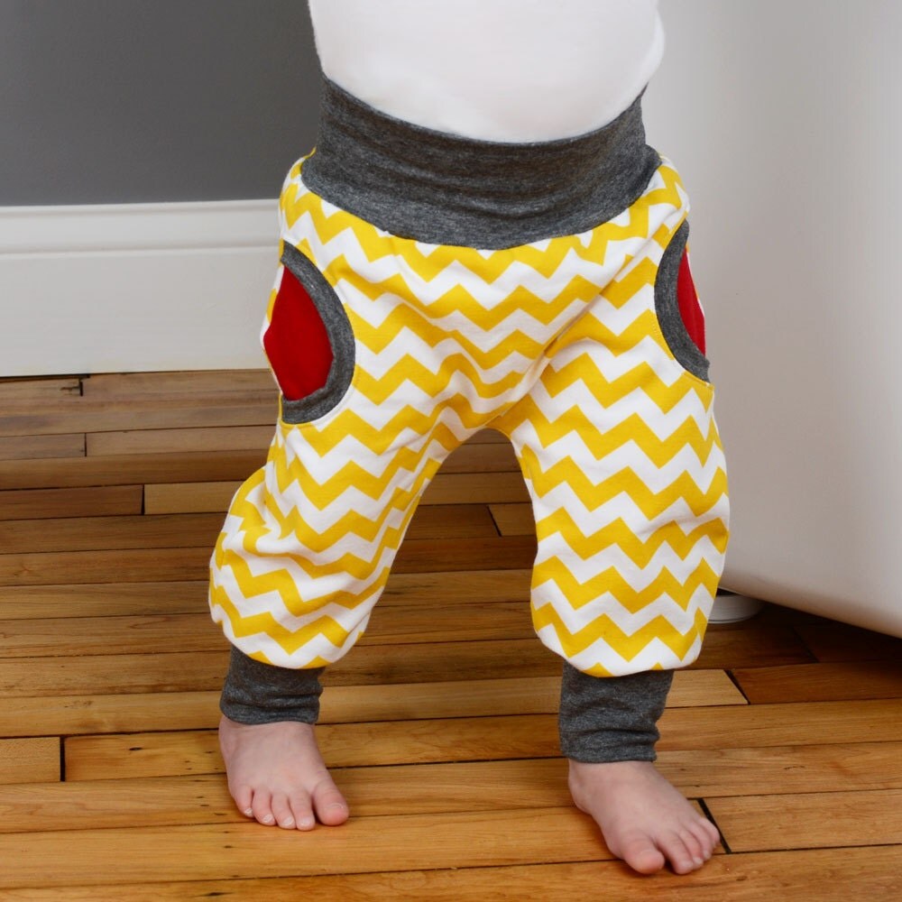 Sewing pattern for baby pants with cuffs and faux pockets