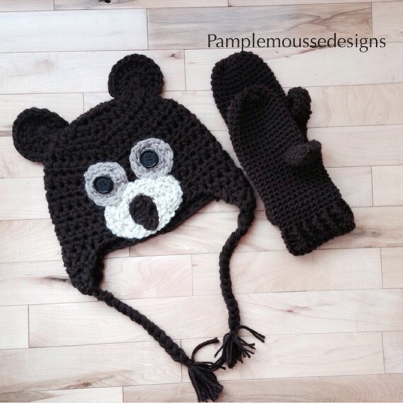 Crochet brown bear ear flap hat and mittens.