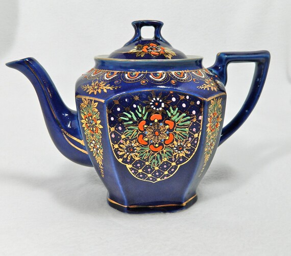Beautiful blue teapot made in Japan hand painted lots of gold