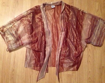 Items similar to Sheer and shimmery mauve evening dress on